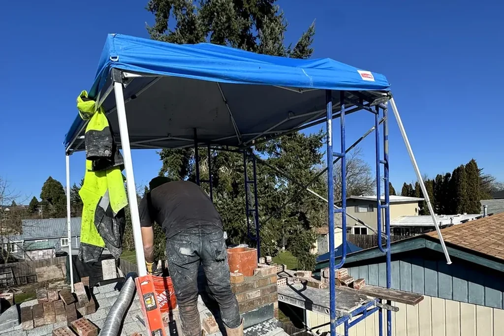 Perfect Chimney crew rebuilding a chimney in the Portland area